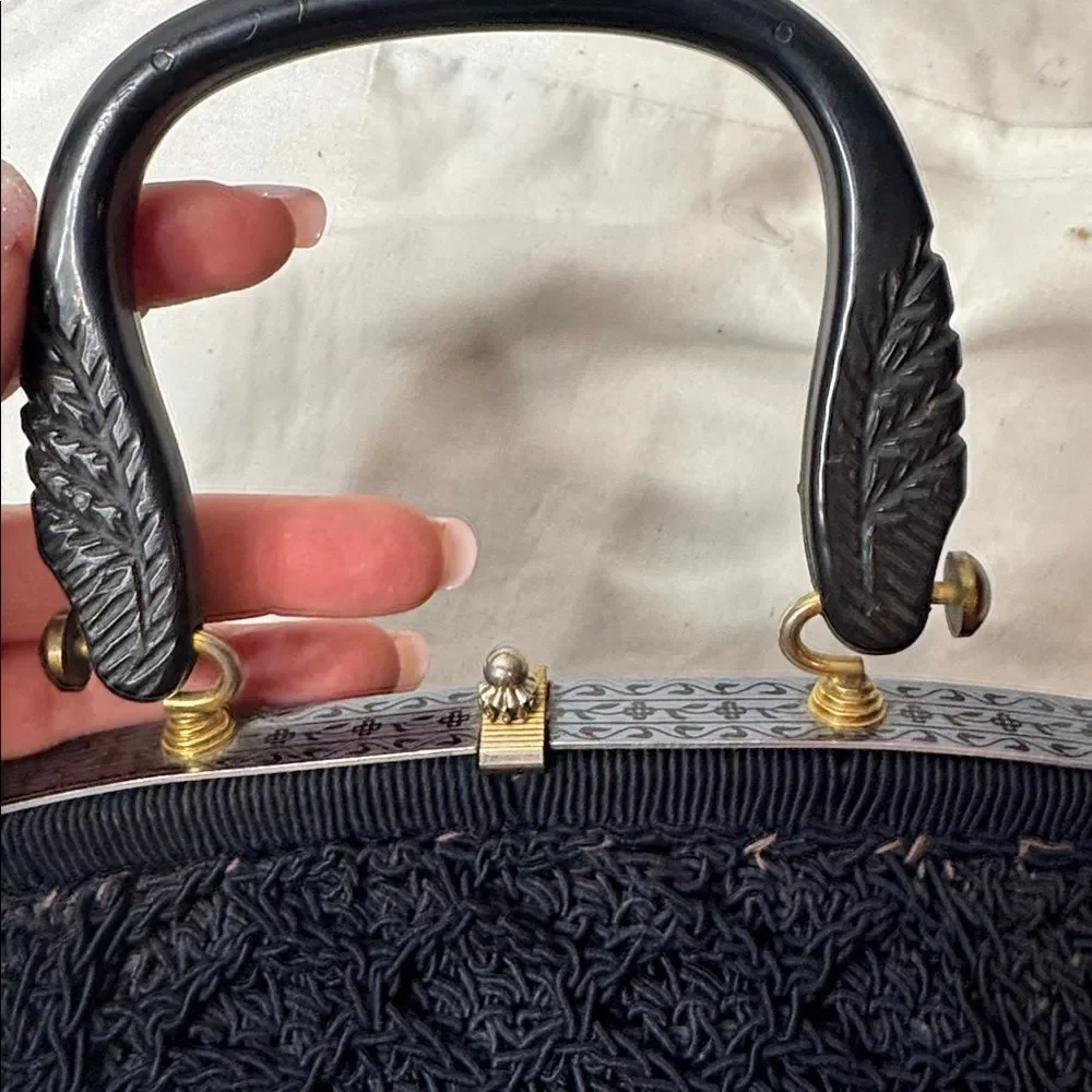 Vintage 60’s Black Knit Dumpling Bag With Silver And Gold Fixtures.